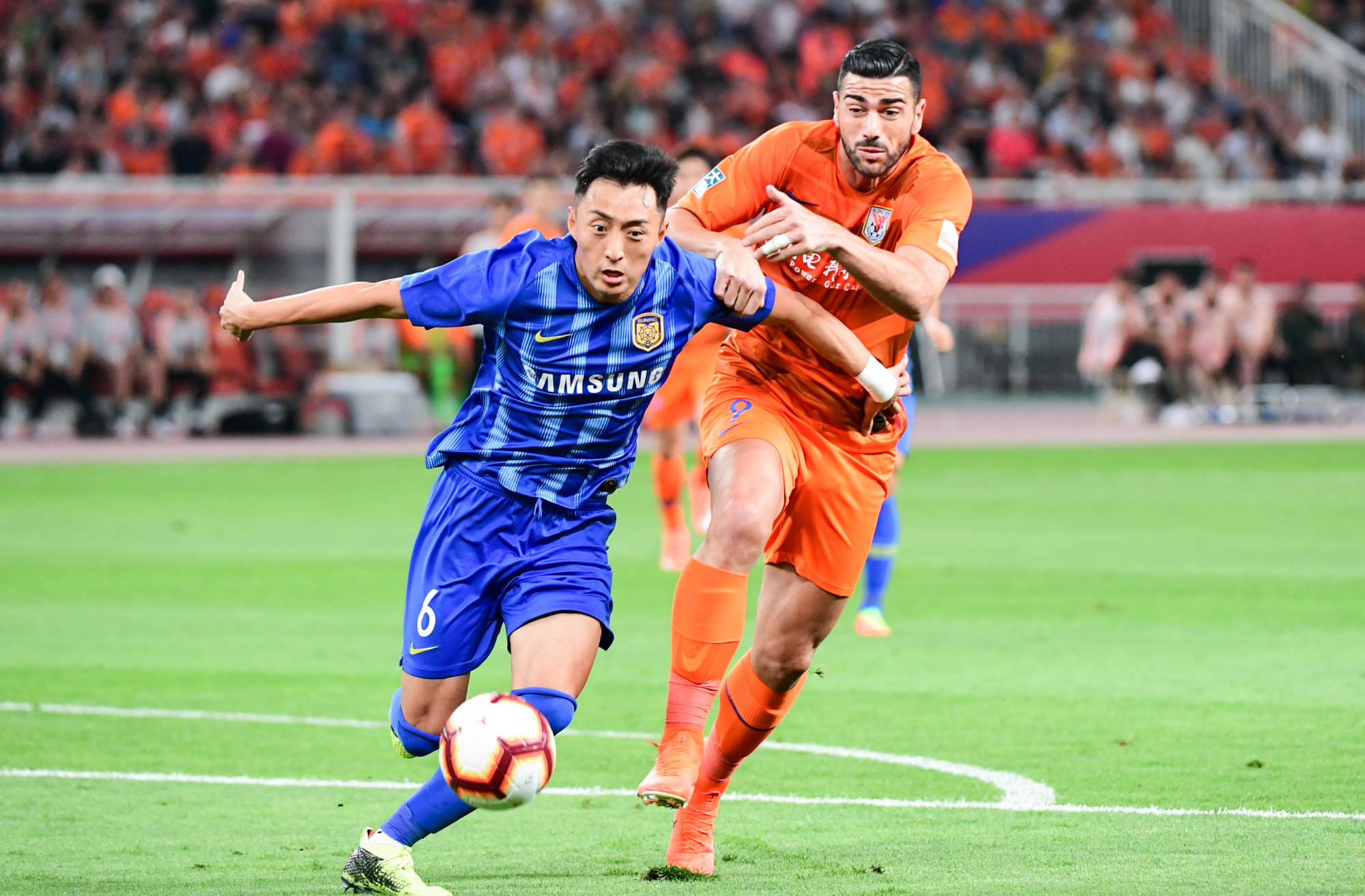 包含甘冈客场逼平对手，保持不败战绩的词条